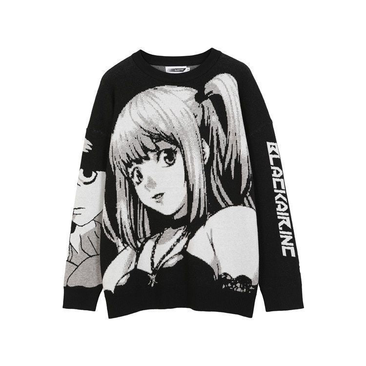 Black sweater by Death Note with Misa Amane-inspired monochrome jacquard artwork resembling anime style, featuring &quot;BlackAnime&quot; text on one sleeve.