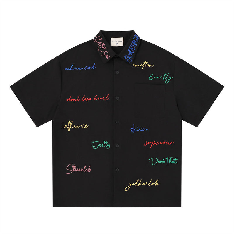 Men's black short-sleeve button-down shirt with multicolor graffiti script embroidery on front and collar