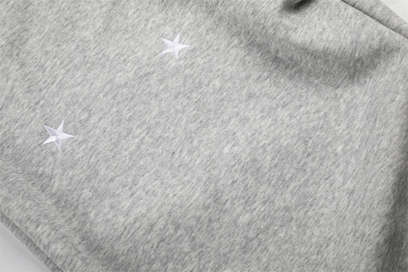 Sweatpants mit weitem Bein, Sternstickerei und umgeschlagenem Sherpa-Bund