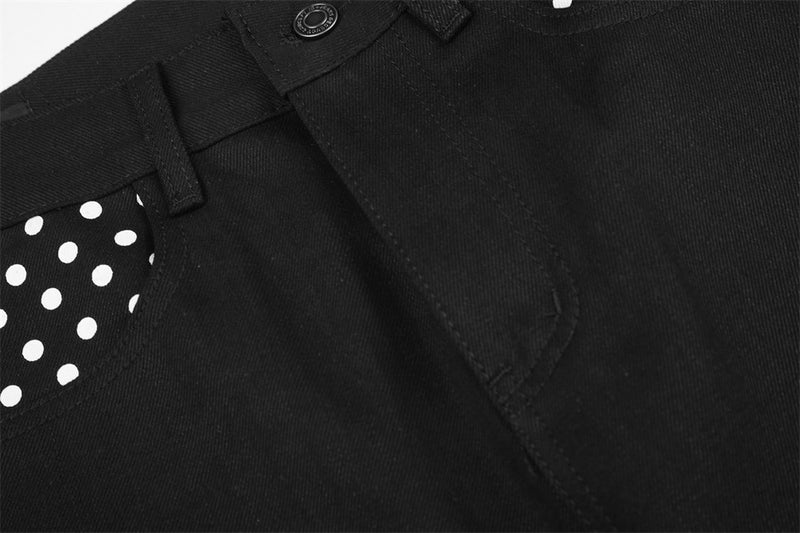 Pantalon à jambes larges avec poches contrastantes à pois et revers aux ourlets