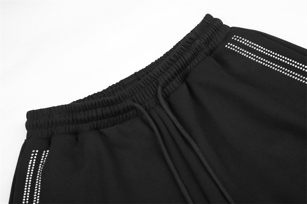 Jogginghose mit weitem Bein und Strass-Schriftzug – Oversize-Streetwear-Jogger für