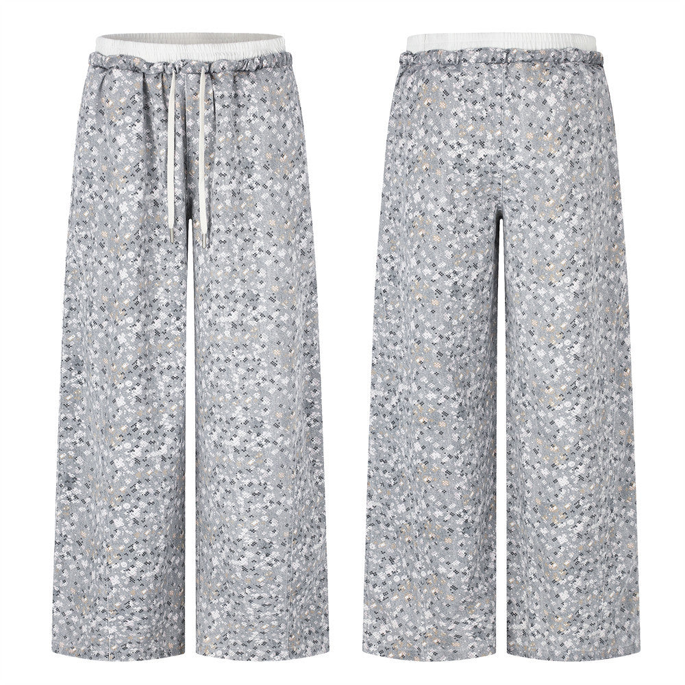 Wide-leg floral print pants shown front and back, with elastic waistband and drawstring