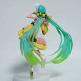 The 19cm Fairy Tale Sleeping Beauty Hatsune Miku PVC Figure showcases her with long turquoise hair and a charming yellow and white outfit decorated with pink flowers, posed running on a round white base. This cute collectible is perfect for Vocaloid fans.