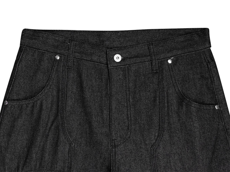Jean homme à jambes larges avec broderie de badge et empiècements patchwork déconstruits