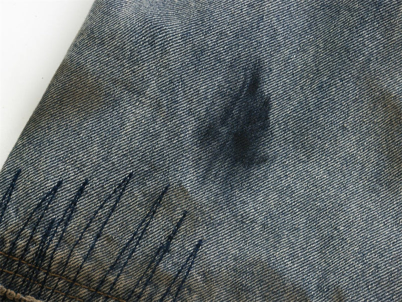Baggy Wide-Leg Jeans – Chaotic Embroidery, Distressed Denim & Arc-Hem Design
