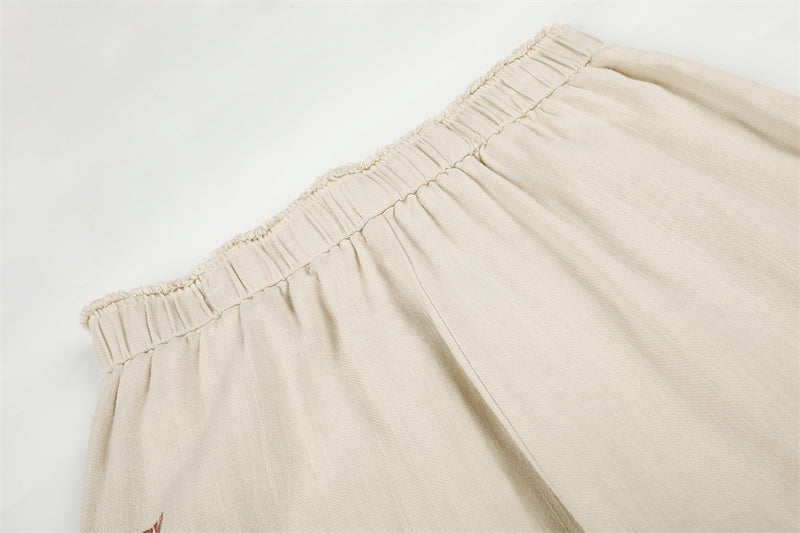 Wide-Leg Graphic Print Pants – Raw Hem Elastic Waist Straight Trousers