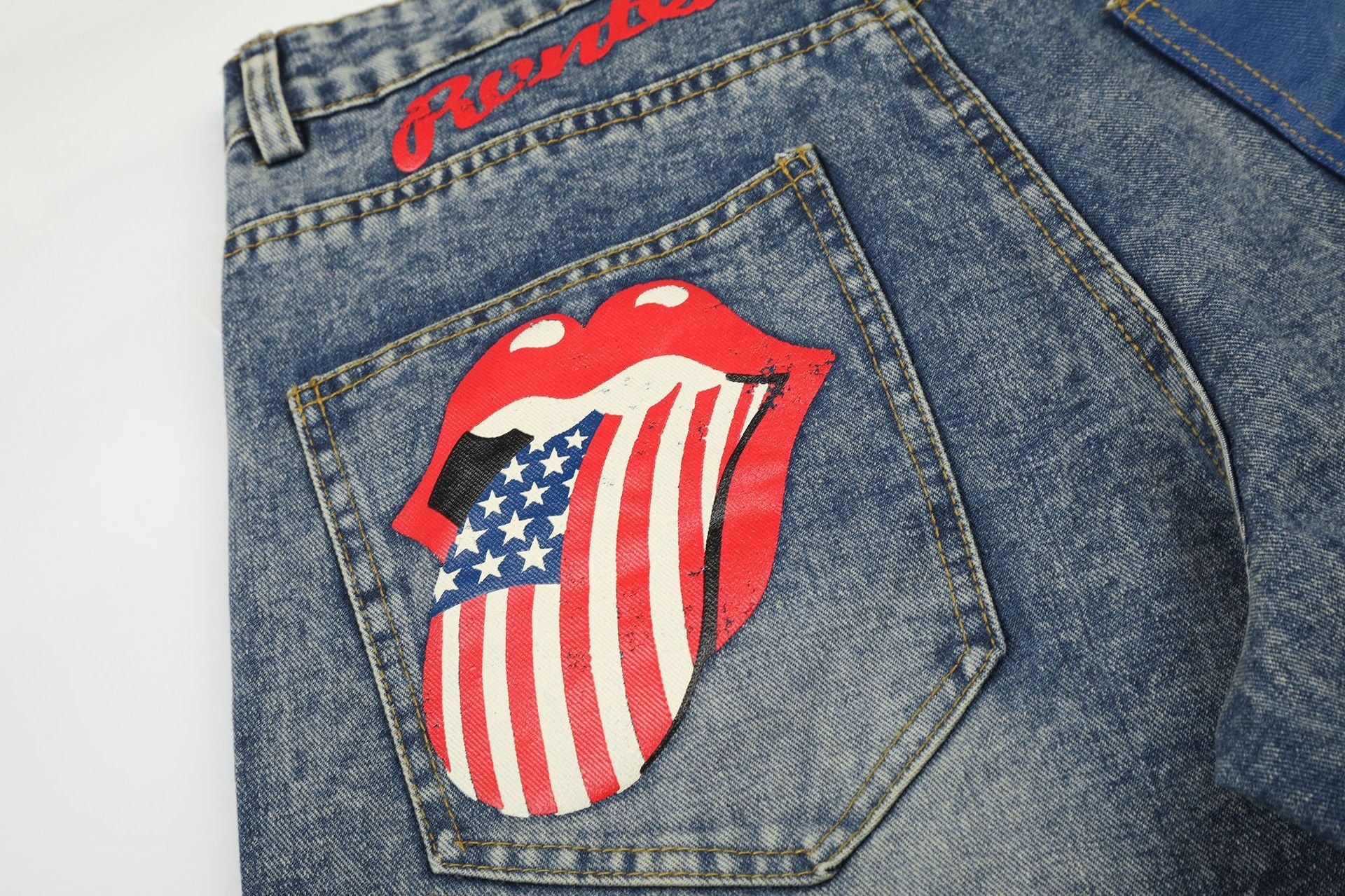 Jean baggy à jambes larges avec poches arrière graphiques – Coupe tonneau oversize