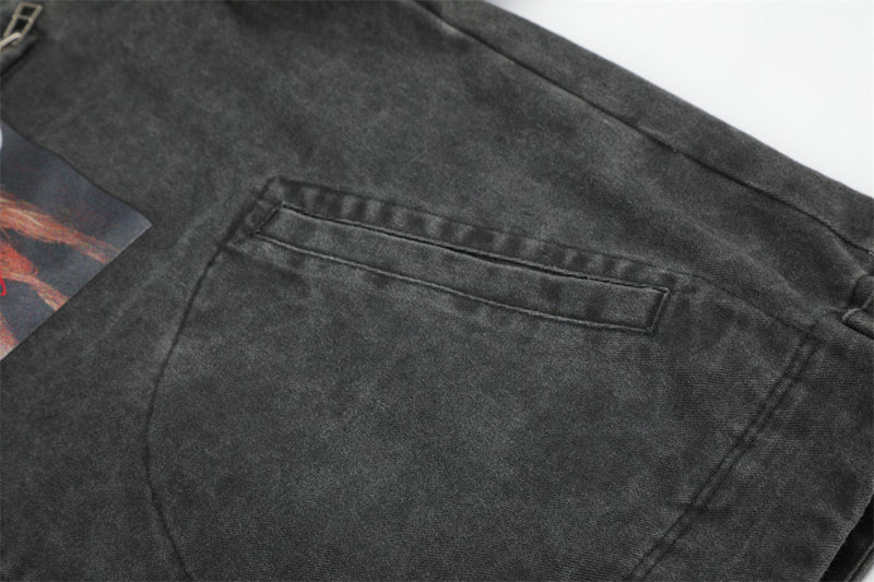 Close-up of black jacket back pocket detail with top welt opening
