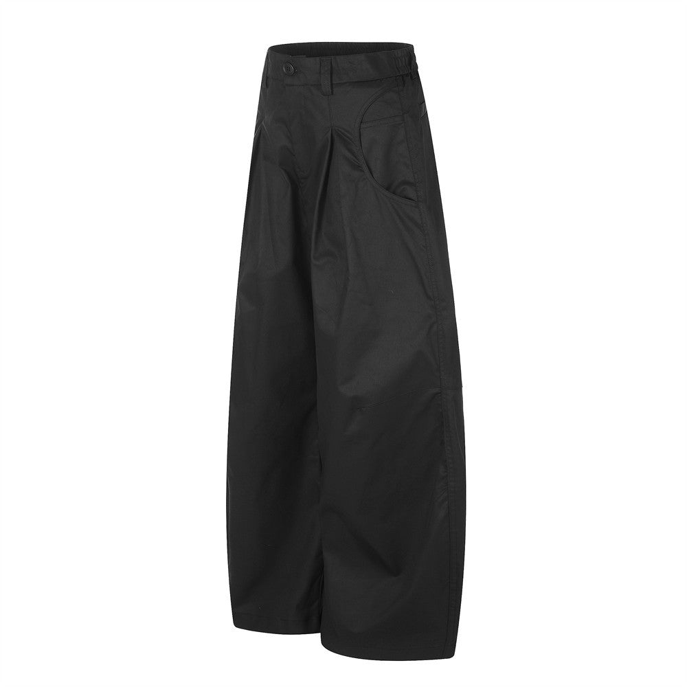 Wide-Leg Pleated Trousers – Oversized Silhouette with Curved Hem