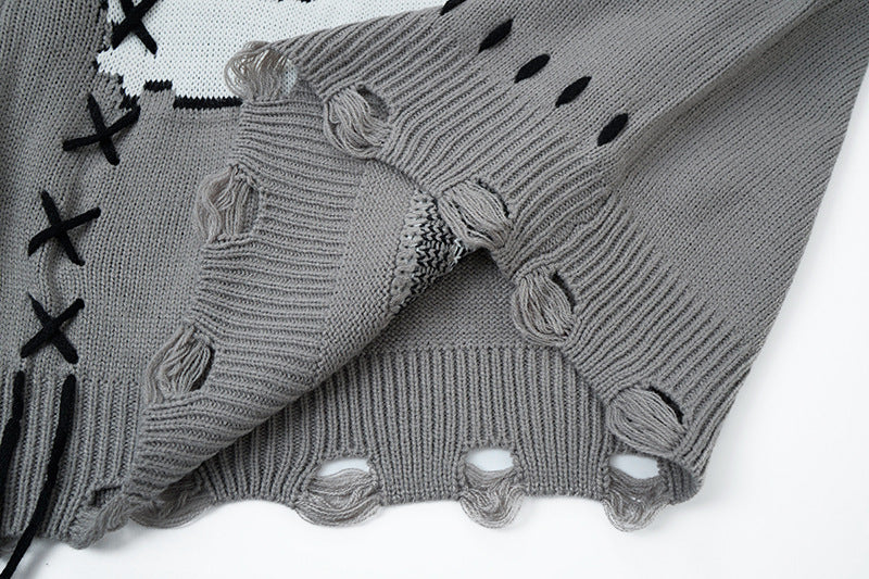 Pull en maille effet usé motif chat – Col rond oversize avec point de croix
