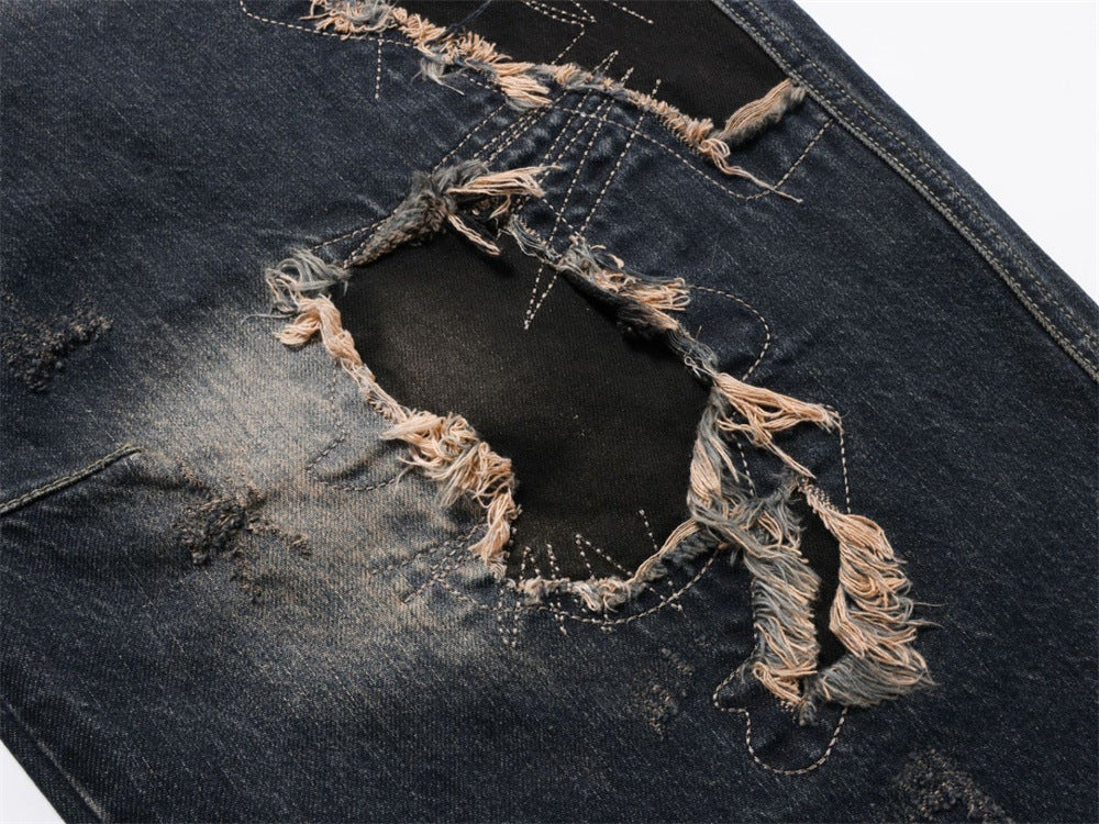Distressed Patchwork Wide-Leg Jeans – Baggy Ripped Denim with Washed Finish