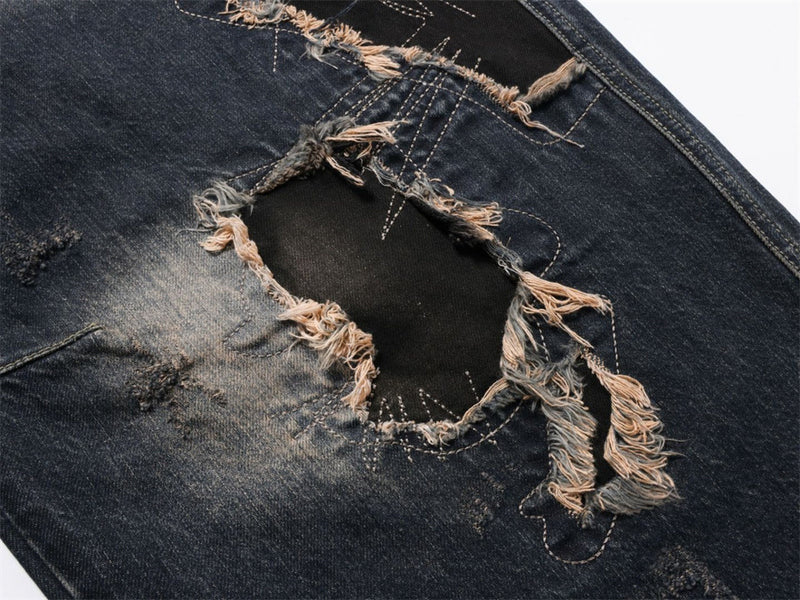 Distressed Patchwork Wide-Leg Jeans – Baggy Ripped Denim with Washed Finish