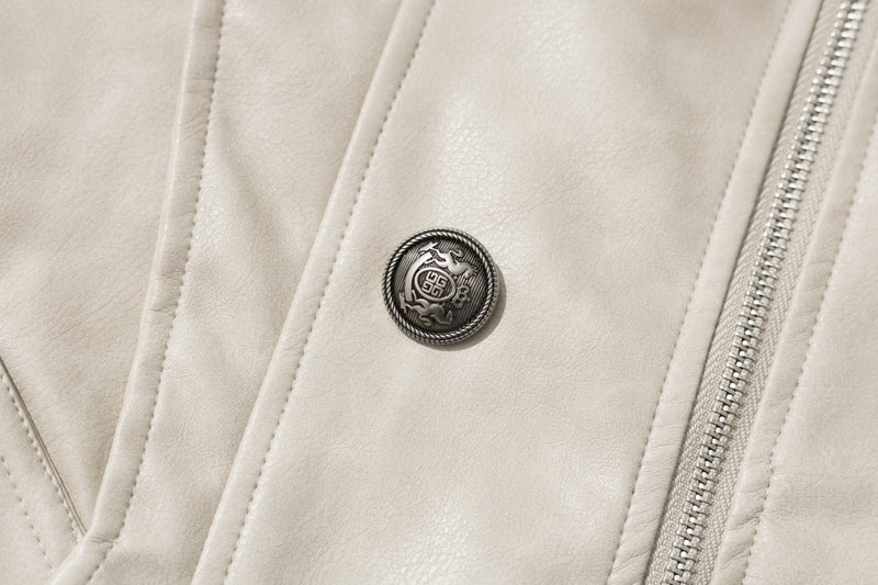 Veste matelassée en similicuir avec col en fausse fourrure et boutons croisés