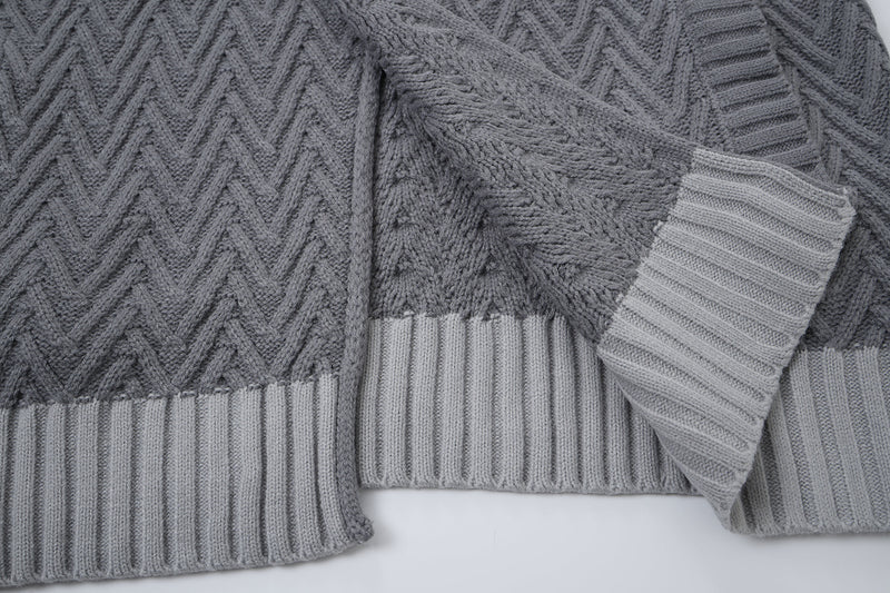 Cardigan en maille torsadée chevrons avec col châle et poches avant