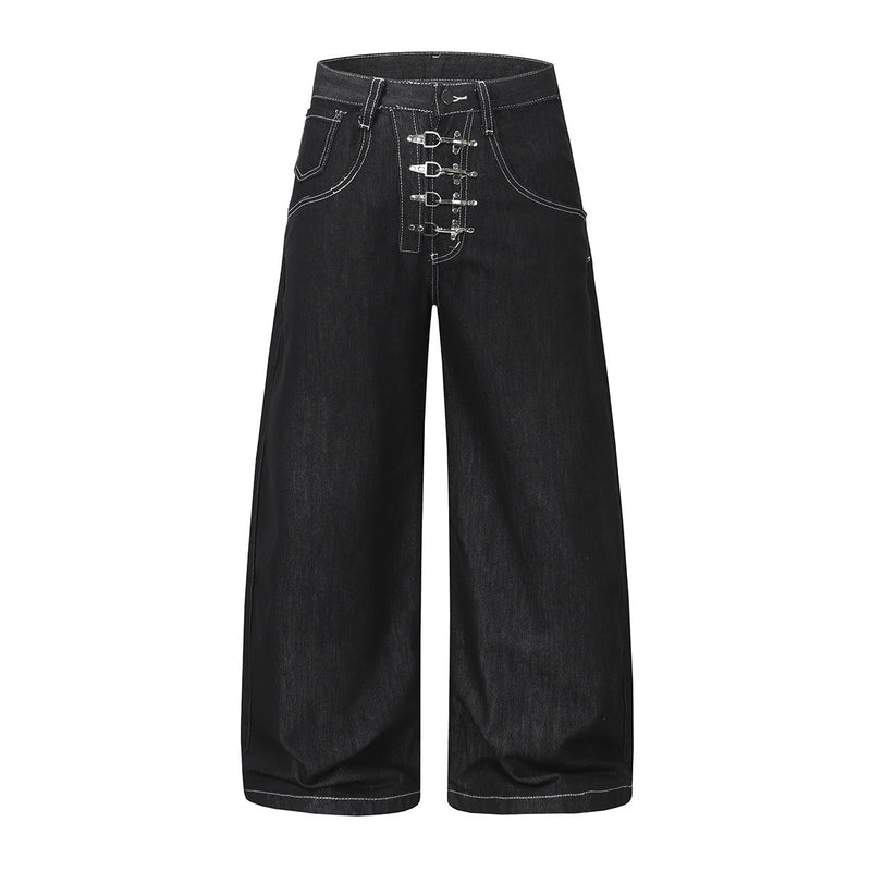 Front and back view of wide-leg baggy black denim jeans with silver safety-pin hook closures and white contrast topstitching