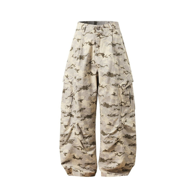 Front view of beige desert camo cargo pants with pleated wide legs