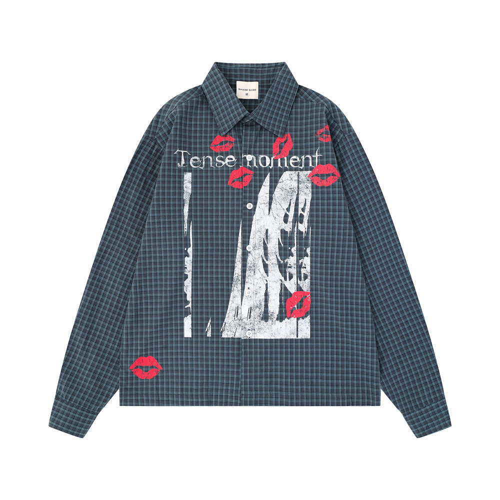 Oversized plaid long sleeve shirt with distressed graphic print and red lip stamp motifs in slate blue colorway