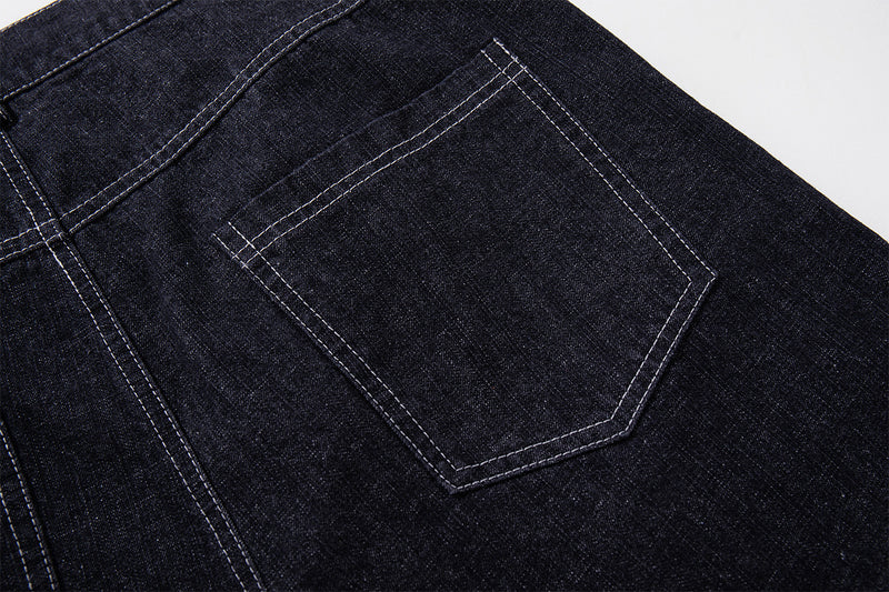 Vaqueros baggy de pierna ancha, lavado oscuro, bragueta diagonal de botones y denim crudo