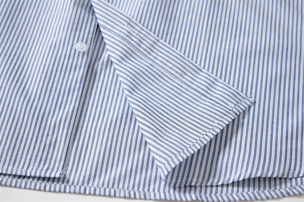 Close-up of the striped shirt hem and side seam
