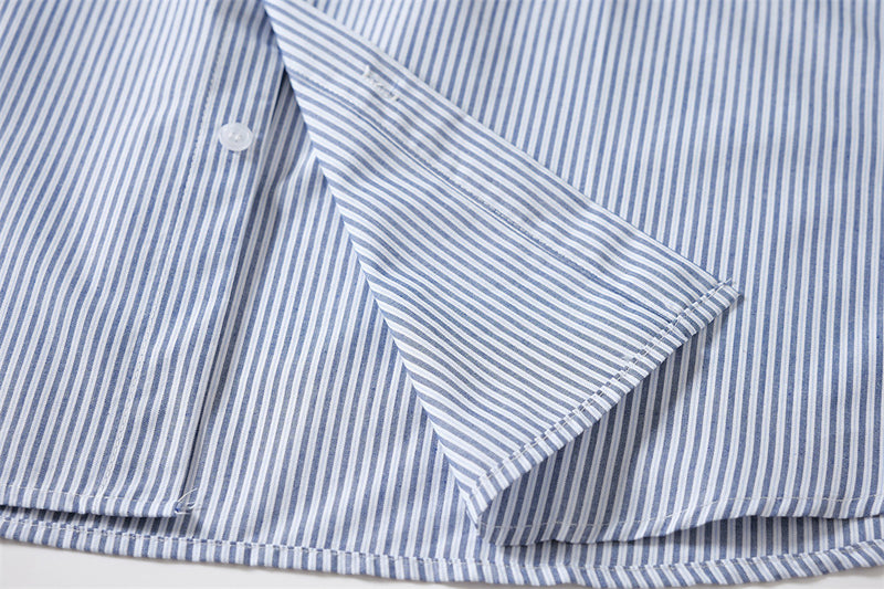 Close-up of the striped shirt hem and side seam
