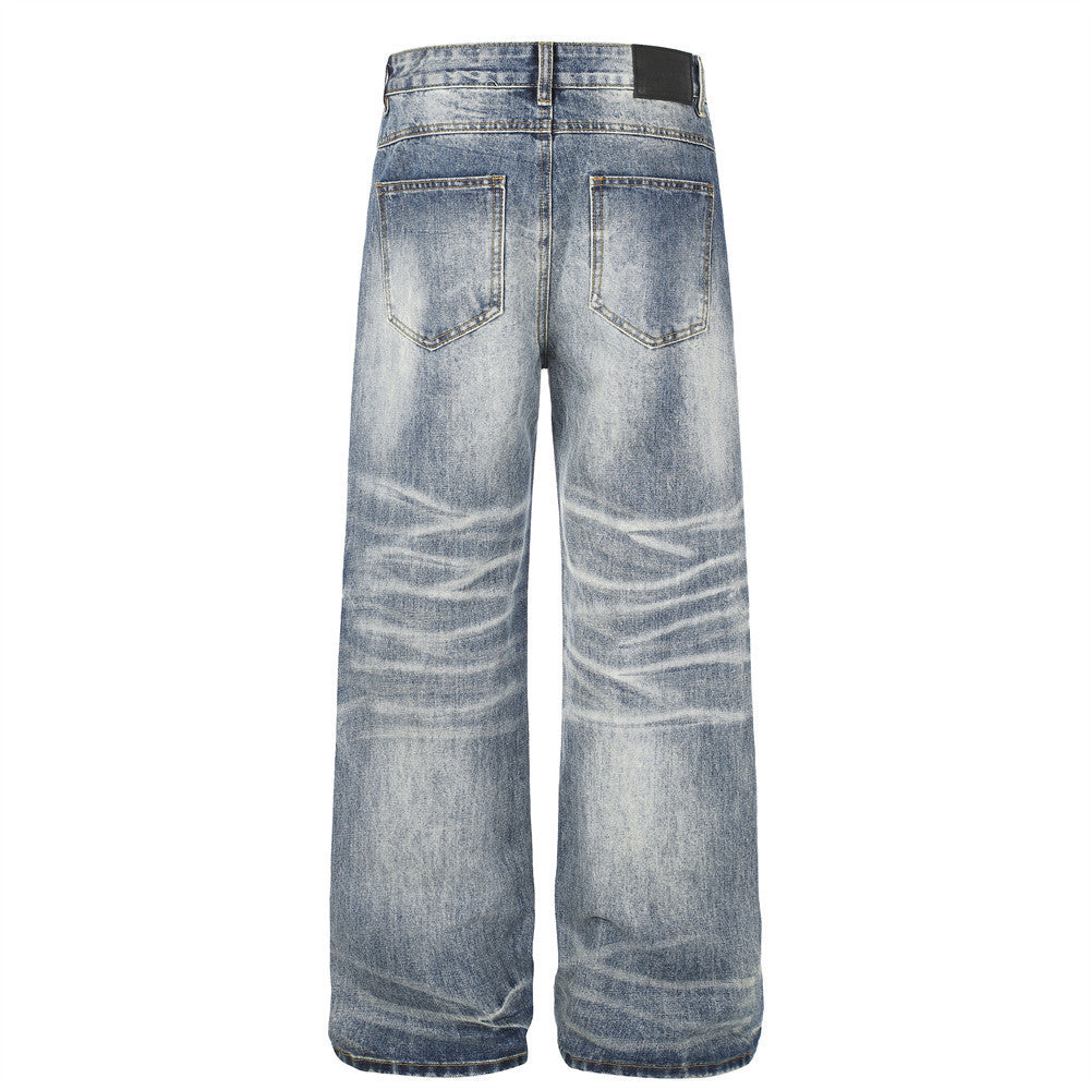 Wide-Leg Straight Jeans – Herrenjeans aus verwaschenem blauem Vintage-Denim mit Destroyed-Details
