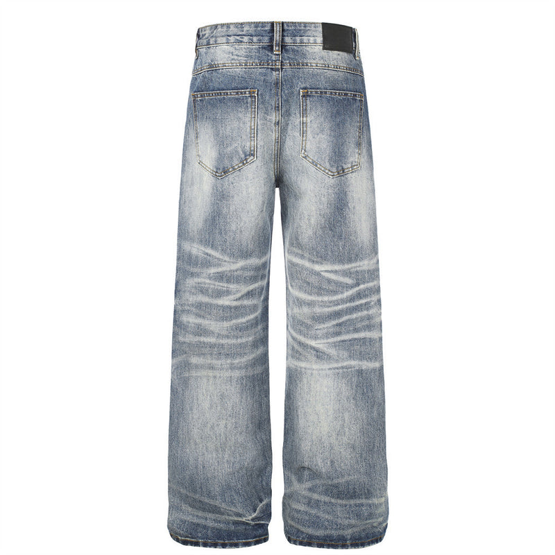 Wide-Leg Straight Jeans – Herrenjeans aus verwaschenem blauem Vintage-Denim mit Destroyed-Details