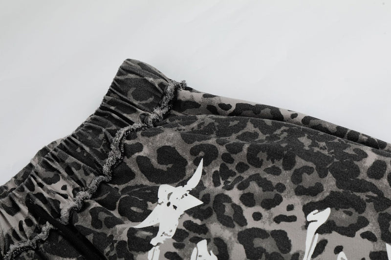 Wide-Leg Leopard Print Pants with Skull & Crossbones Graphic