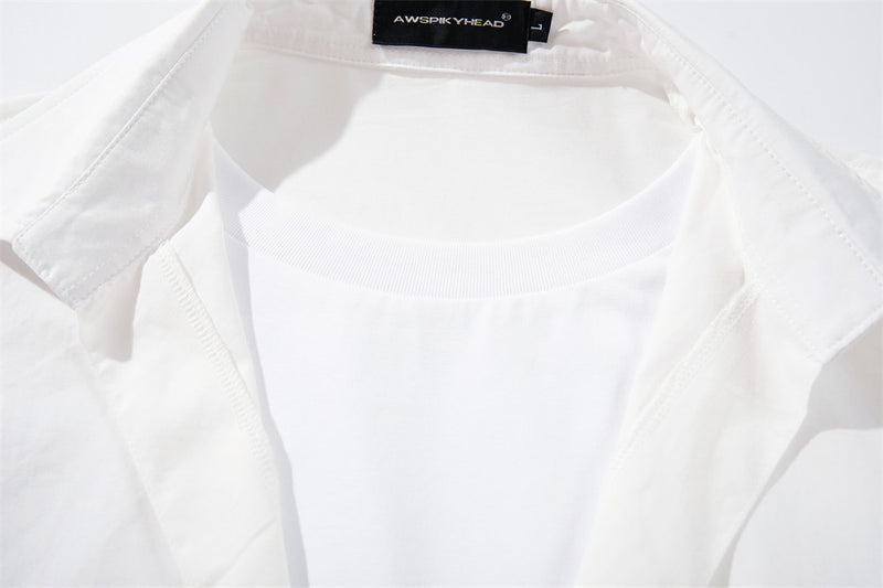 White faux layered collar and ribbed crew neckline close-up