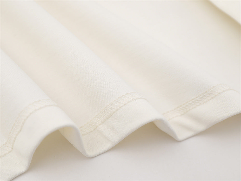Camiseta de manga larga para hombre con bloques de color y bordado de texto – Corte relajado