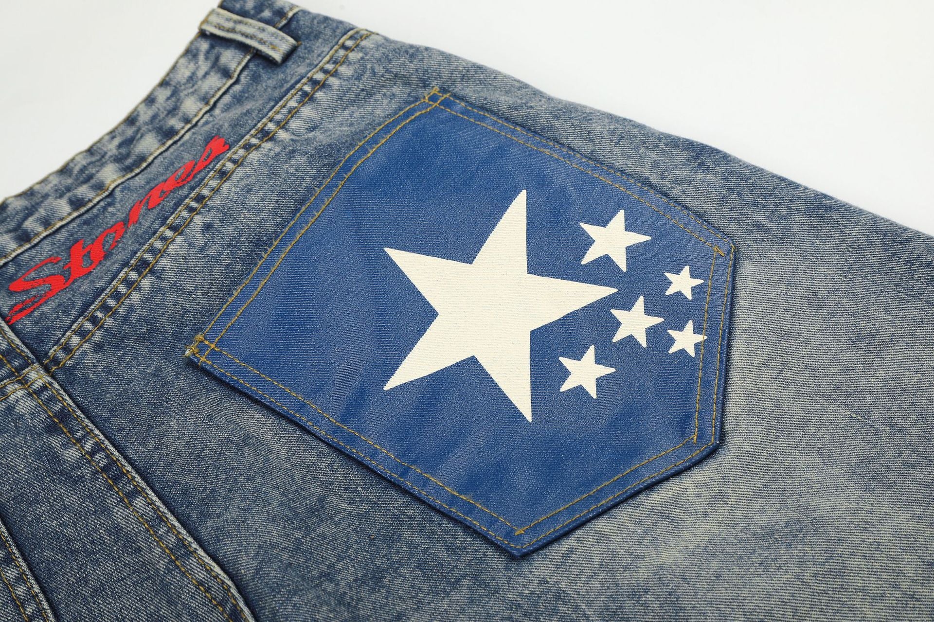 Jean baggy à jambes larges avec poches arrière graphiques – Coupe tonneau oversize