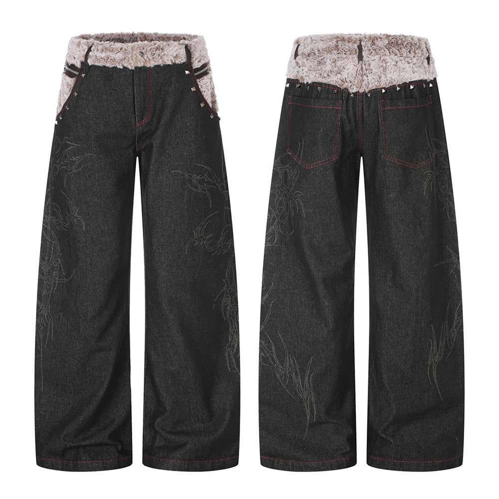 Schwarze Wide-Leg-Jeans mit kontrastierendem Bund aus grauem Kunstfell, Pyramiden-Nieten und tonaler Drachenstickerei an den Beinen