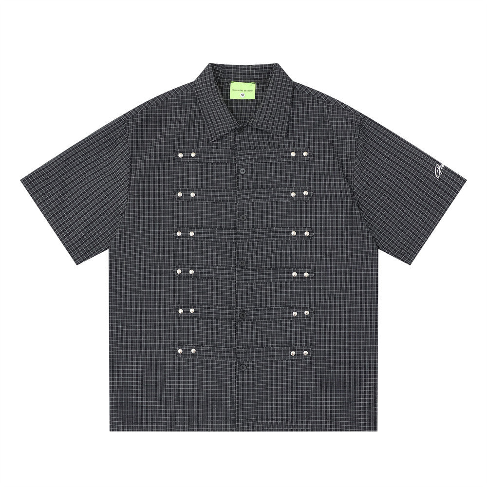 Oversized plaid short sleeve shirt with pearl stud details in charcoal colorway, front view