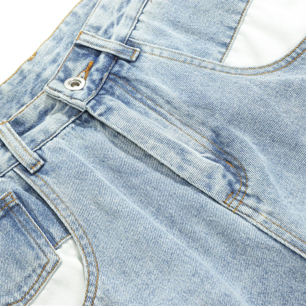Close-up of front waistband and pocket seam on light wash denim
