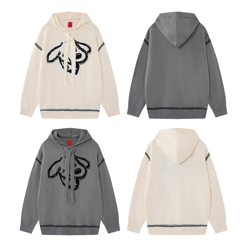 Pull à capuche oversize en maille jacquard avec grand motif graphique sur le devant
