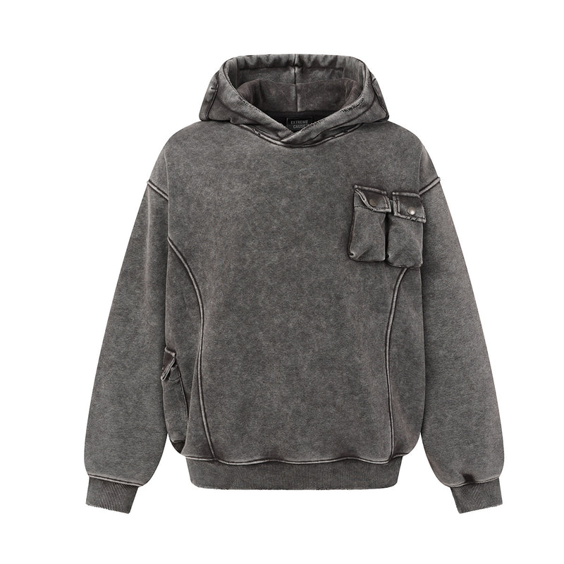 Oversized acid wash pullover hoodie with snap-button cargo chest pocket and contrast topstitching in charcoal gray