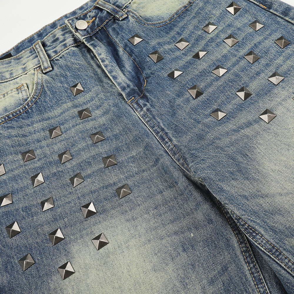 Jean homme coupe large – Denim délavé effet usé avec clous pyramidaux