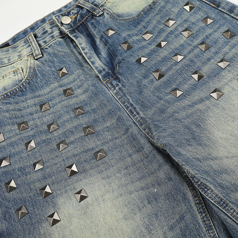 Jean homme coupe large – Denim délavé effet usé avec clous pyramidaux