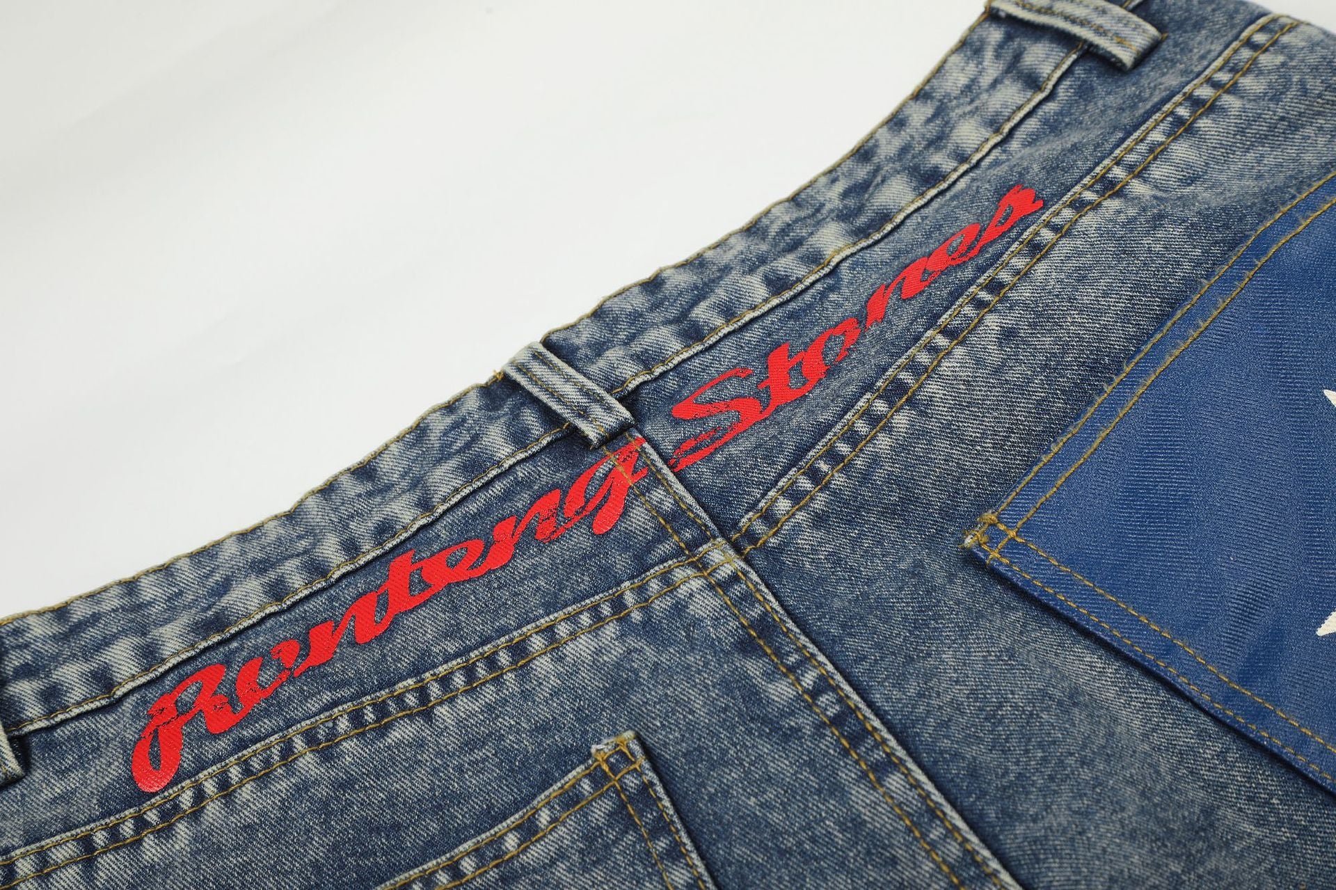 Jean baggy à jambes larges avec poches arrière graphiques – Coupe tonneau oversize