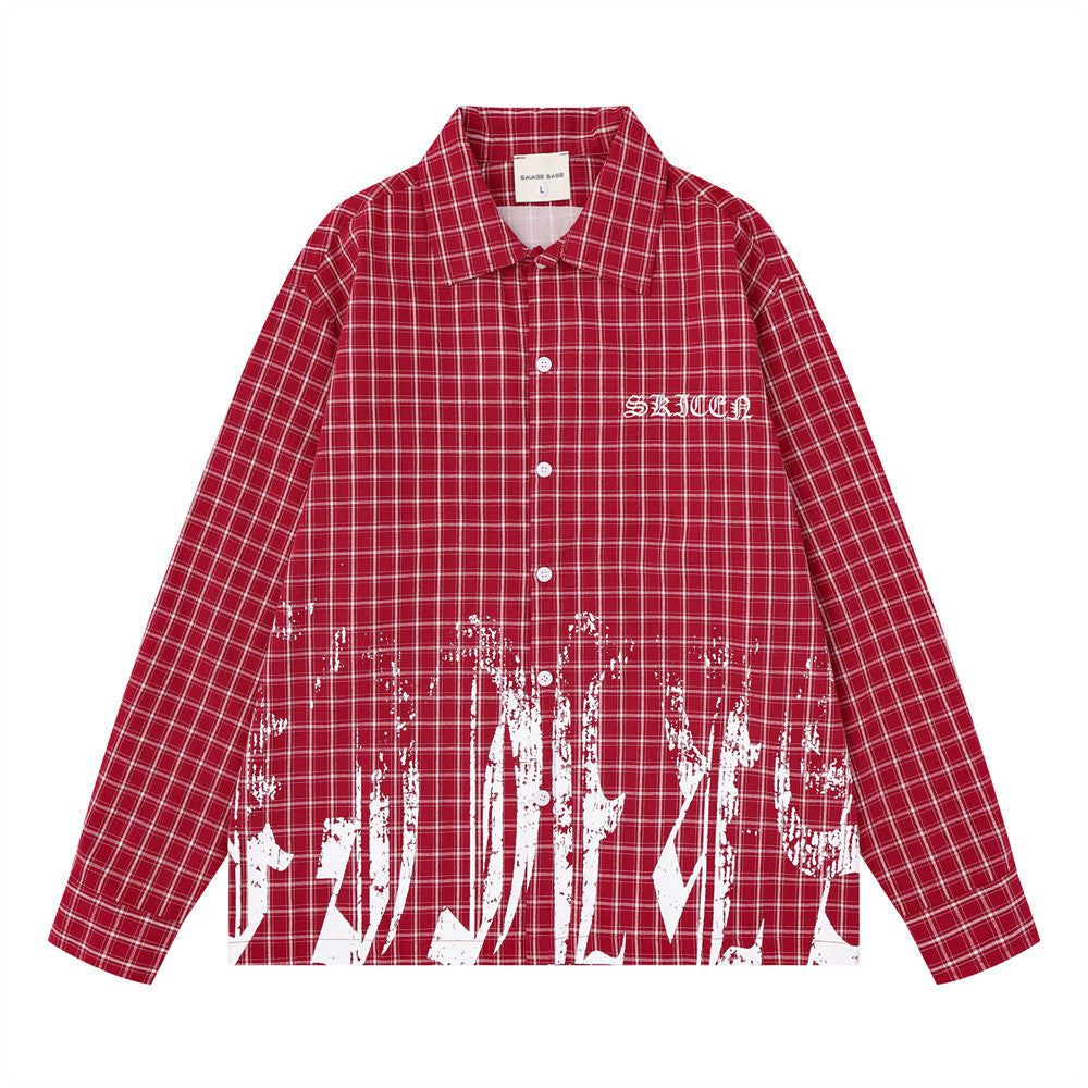 Oversized plaid long sleeve shirt in red with white graffiti brushstroke print and Old English embroidery on chest, front vie