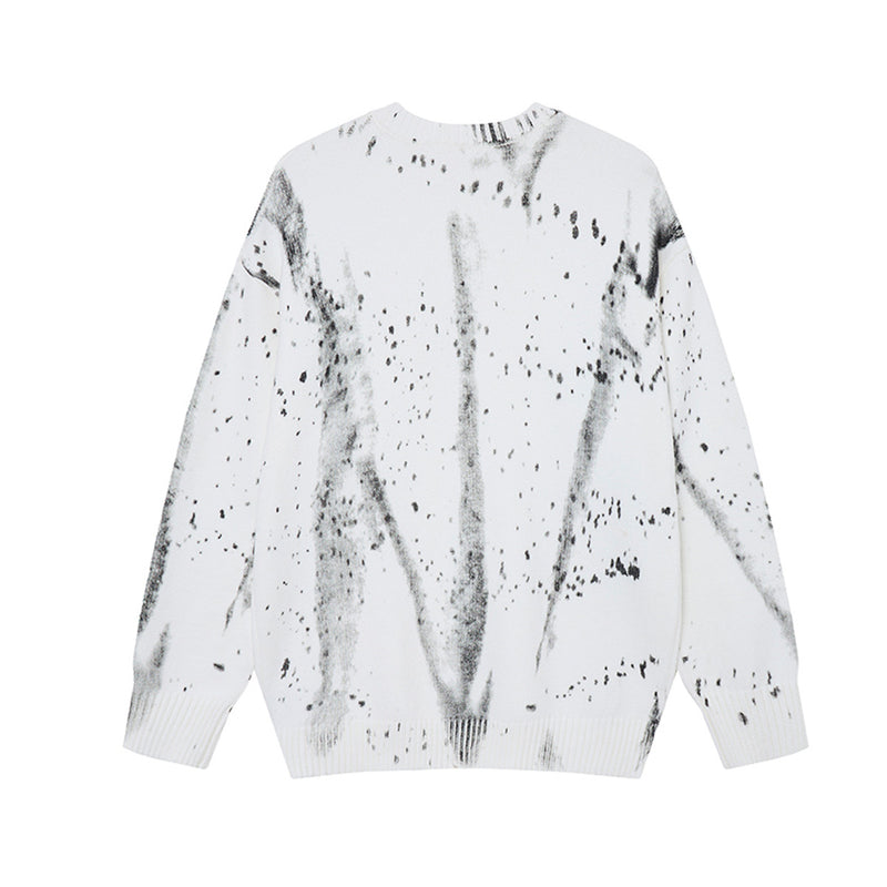 Pull en maille col rond éclaboussures d’encre – Motif peinture déstructuré