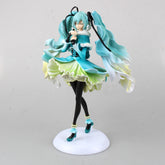 The Hatsune Miku 1/7 Scale 28cm PVC Figure – Elegant Pose with Flowing Hair showcases a stylized character with long turquoise hair and a teal dress, holding a black and teal microphone-like object. Featuring green accents and black stockings, this collectible stands elegantly on its round white base.