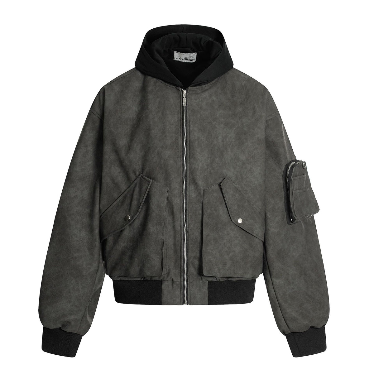 Oversized hooded PU leather bomber jacket with distressed finish, front snap pockets, and sleeve zip pocket in charcoal grey