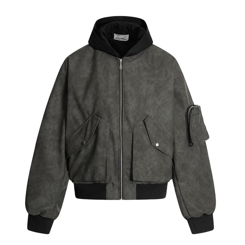 Oversized hooded PU leather bomber jacket with distressed finish, front snap pockets, and sleeve zip pocket in charcoal grey