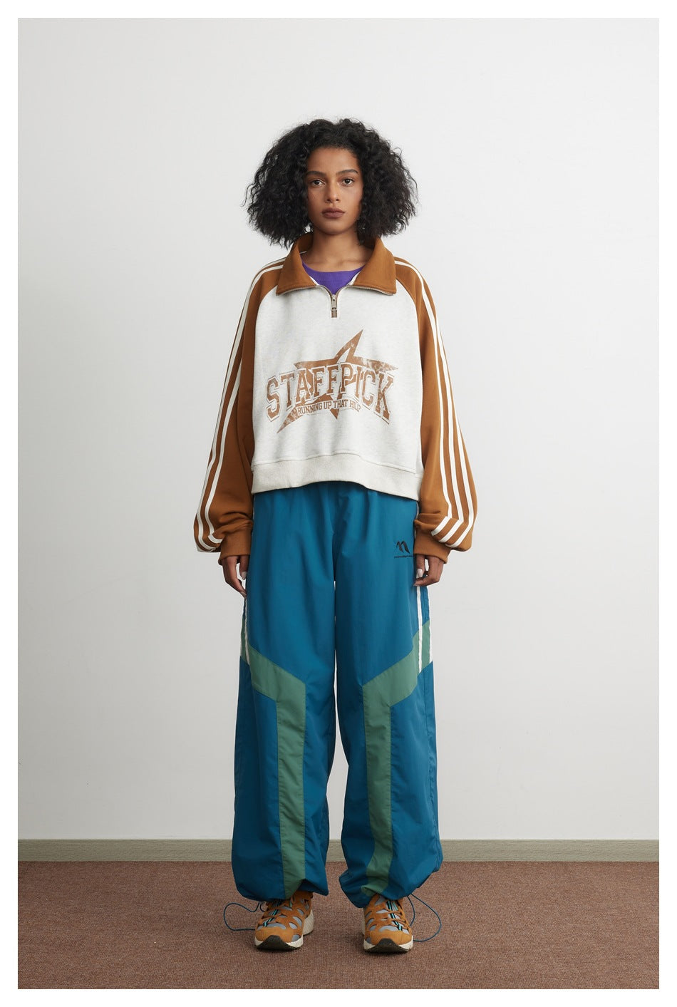 STAFFPICK W41 cropped half-zip sweatshirt jacket in camel and black colorblock with stripe sleeves and star graphic print