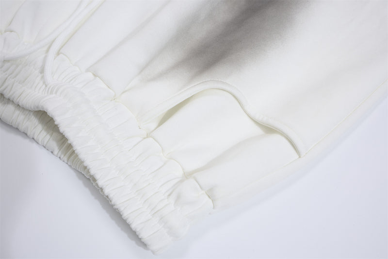 Pantalon de survêtement à jambes larges avec croix gothique et finition délavée