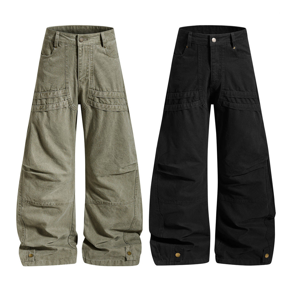 Men's wide-leg baggy cargo pants with pleated panel detailing and utility pockets in black and washed army green