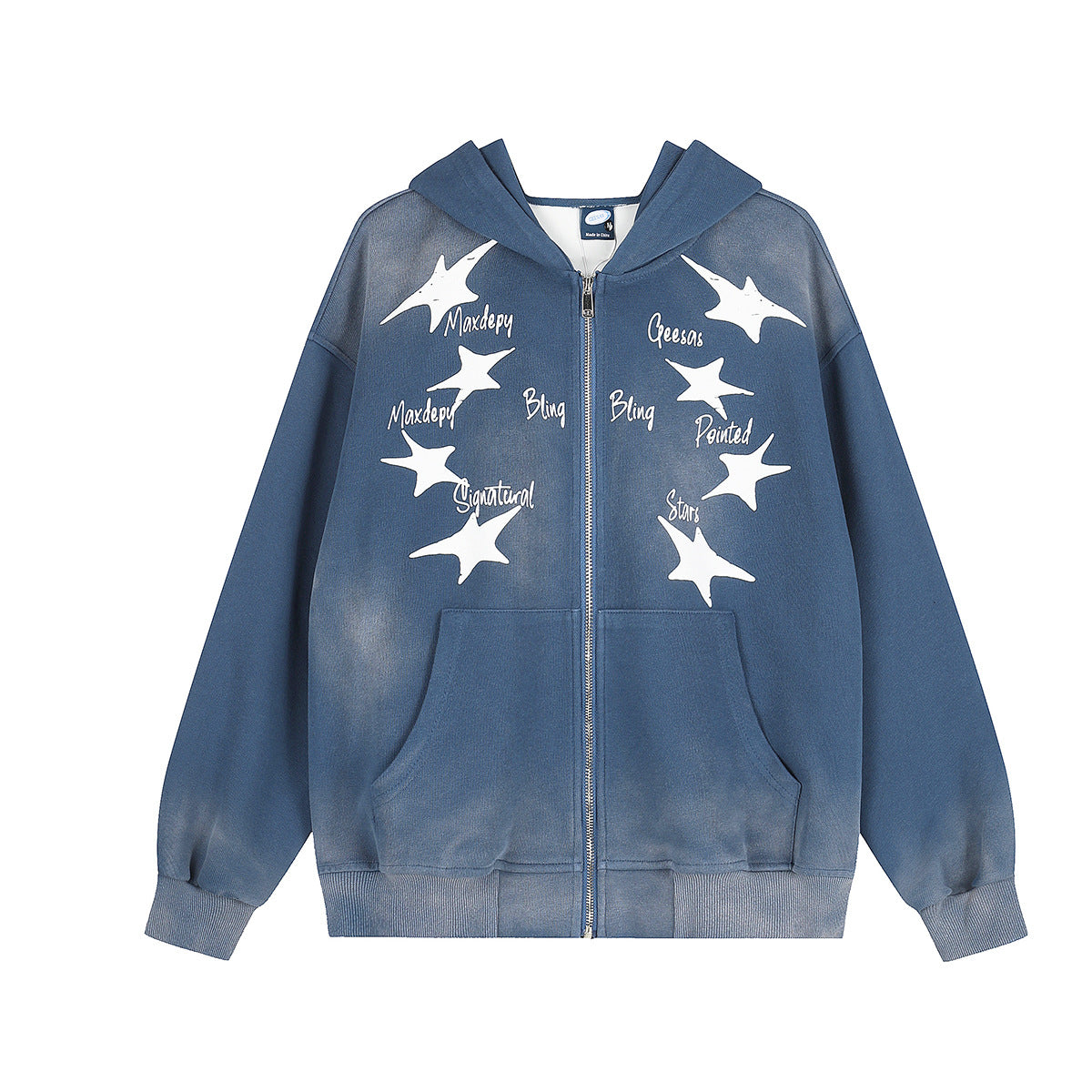 Sudadera extragrande azul lavada con cremallera, estampado de estrella blanca de cuatro puntas y letras manuscritas en la parte delantera