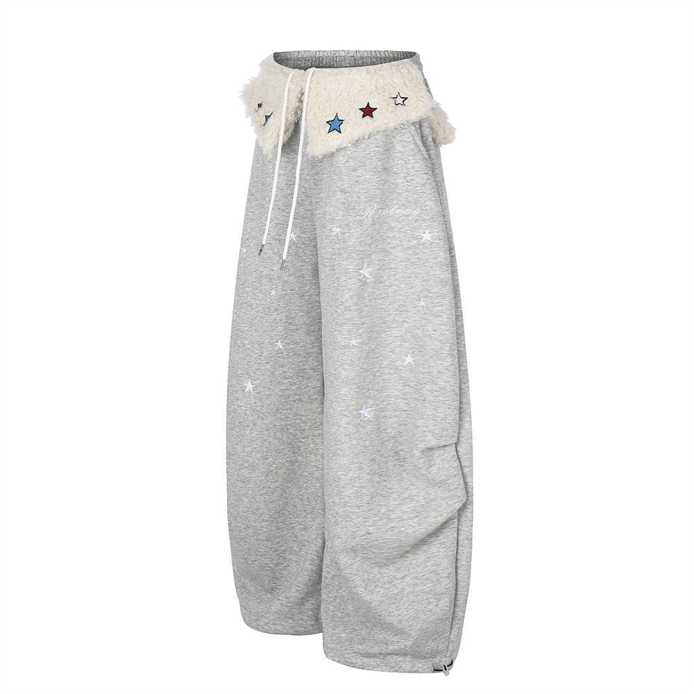 Sweatpants mit weitem Bein, Sternstickerei und umgeschlagenem Sherpa-Bund