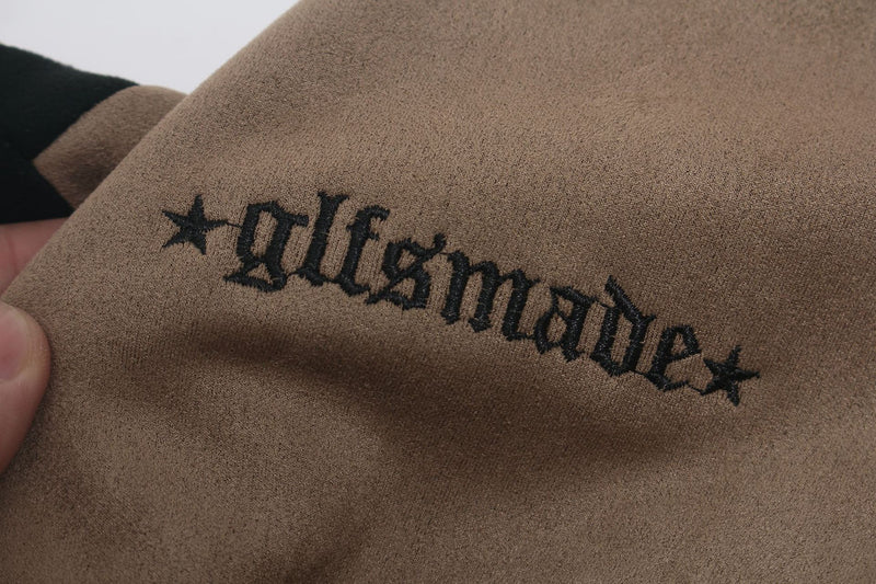 Langarmshirt aus velourslederartigem Material im Colorblock-Design mit Graffiti-Patch-Logo