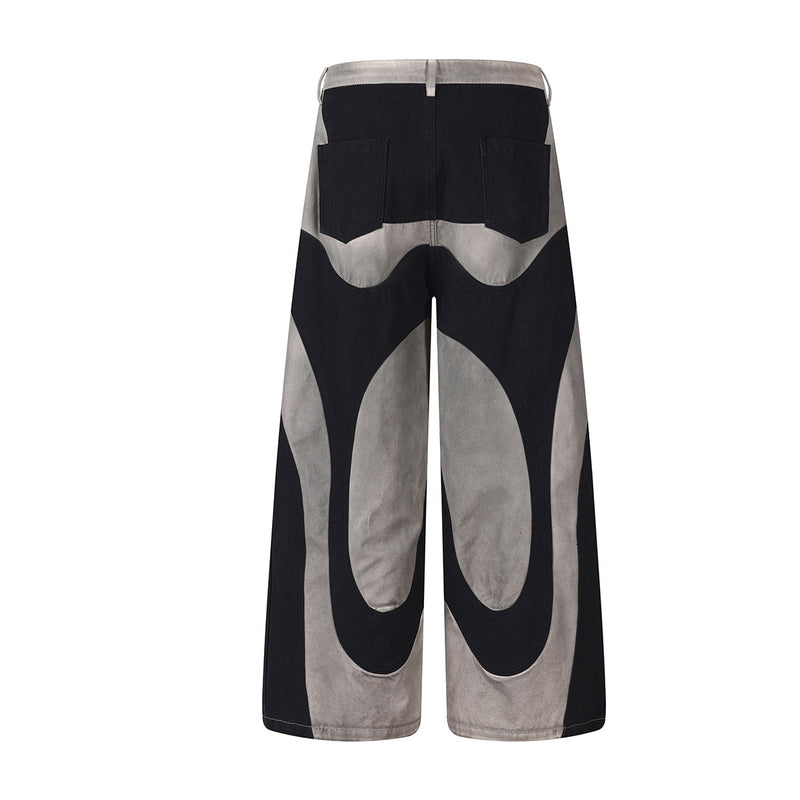 Wide-Leg-Patchworkhose – abstraktes Wellenmuster aus zweifarbigem, schwarz-grauem Washed-Denim